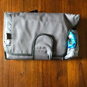 Diaper changing mat with storage.